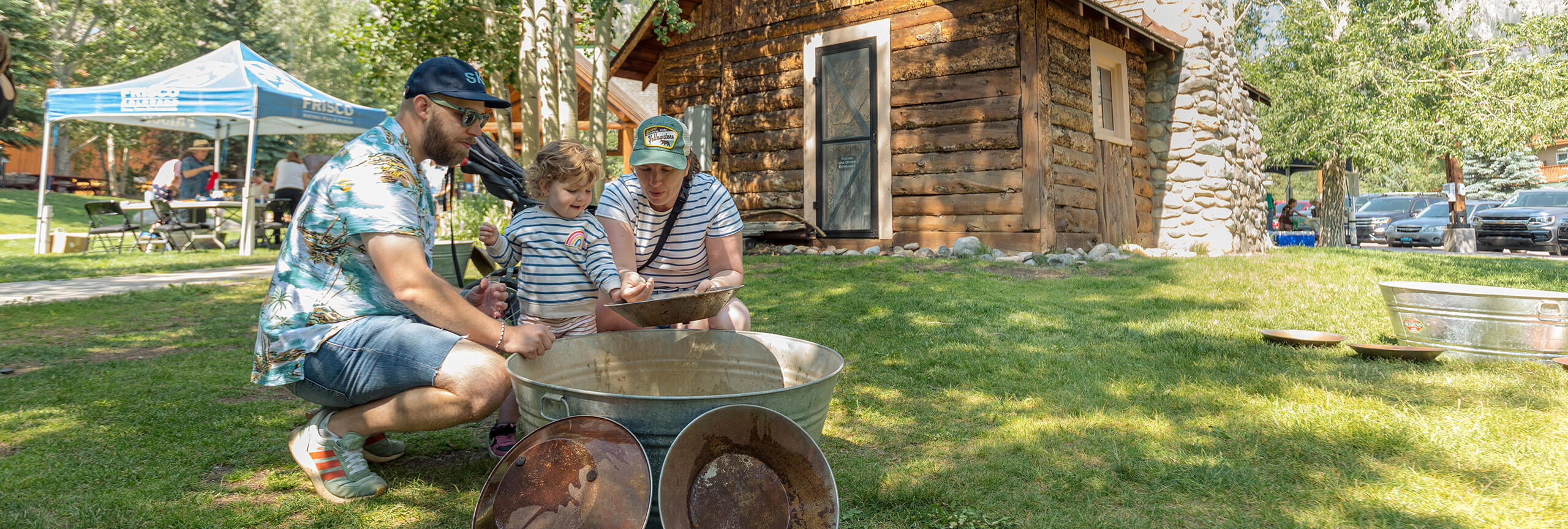 Family gold panning at the Frisco Historic Park during History Day