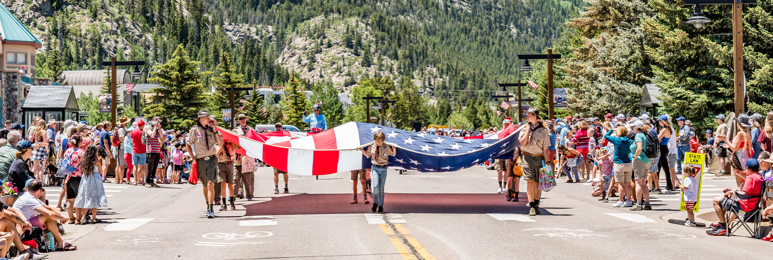 Boy Scouts carry flag during Frisco's Fabulous 4th of July parade